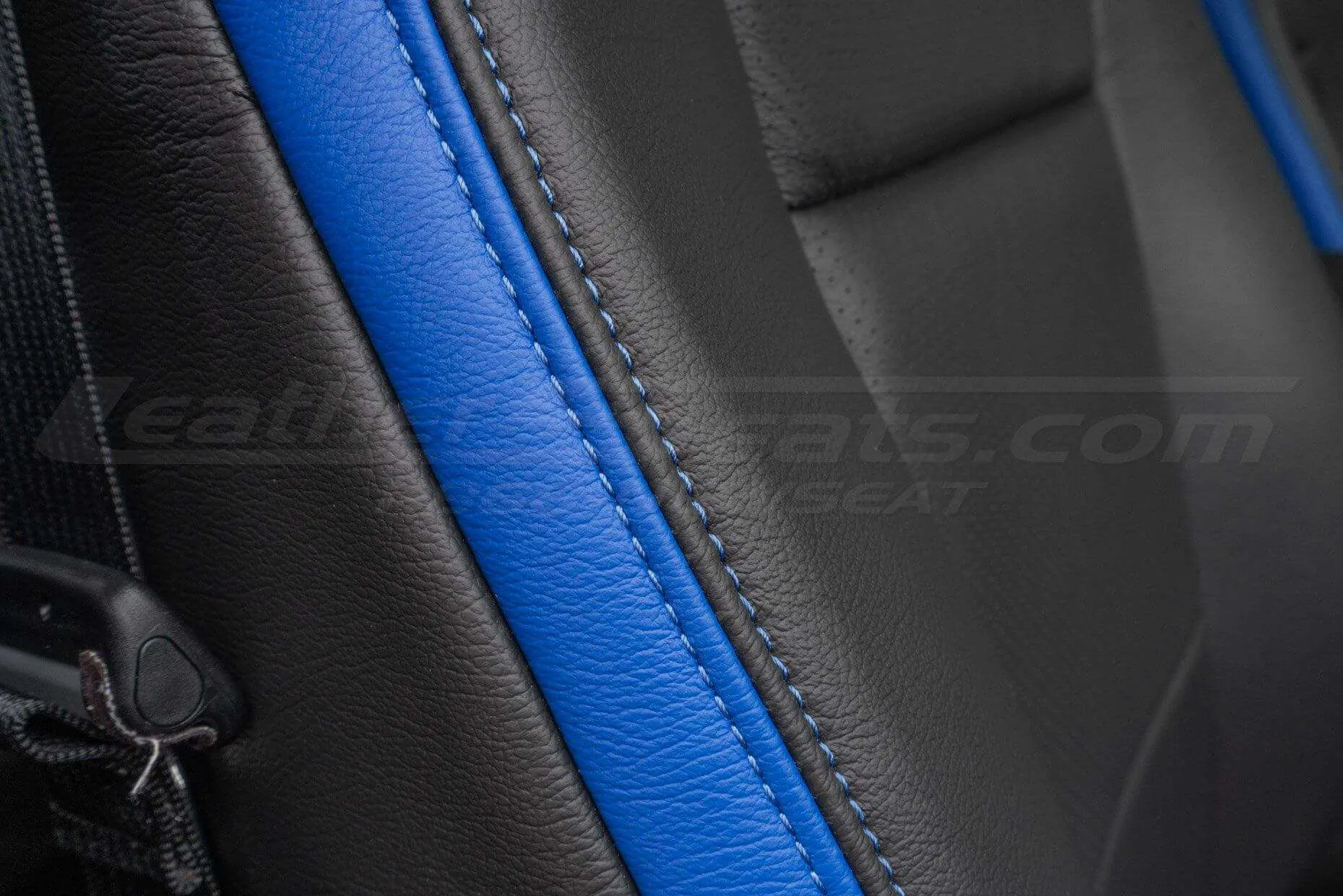 Contrasting double-stitching in Cobalt on Cobalt and Dark Graphite leather
