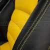 Contrasting Velocity Yellow stitching on Black bolster