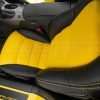 Top down view of Velocity Yellow Body - installed leather seat