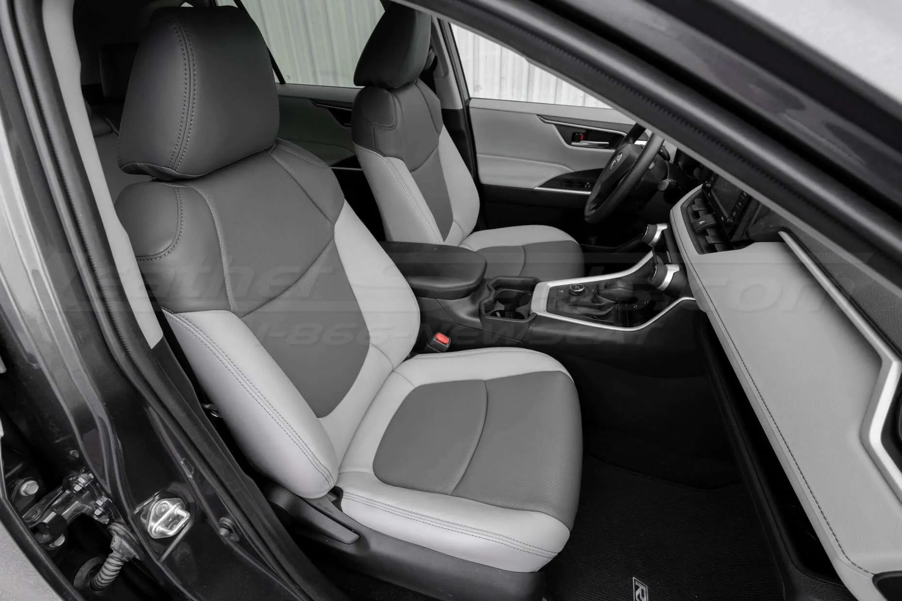 Alternative angle of front passenger seat with installed LeatherSeats.com upholstery