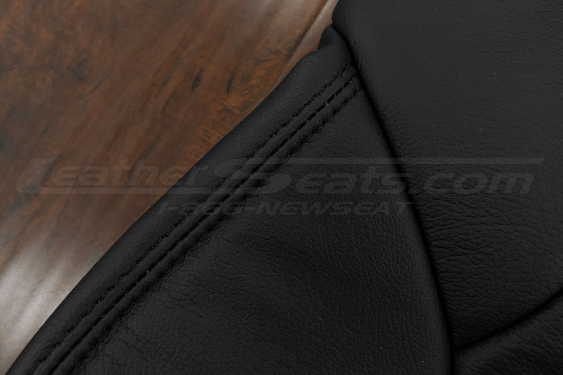 Black double-stitching on Black leather