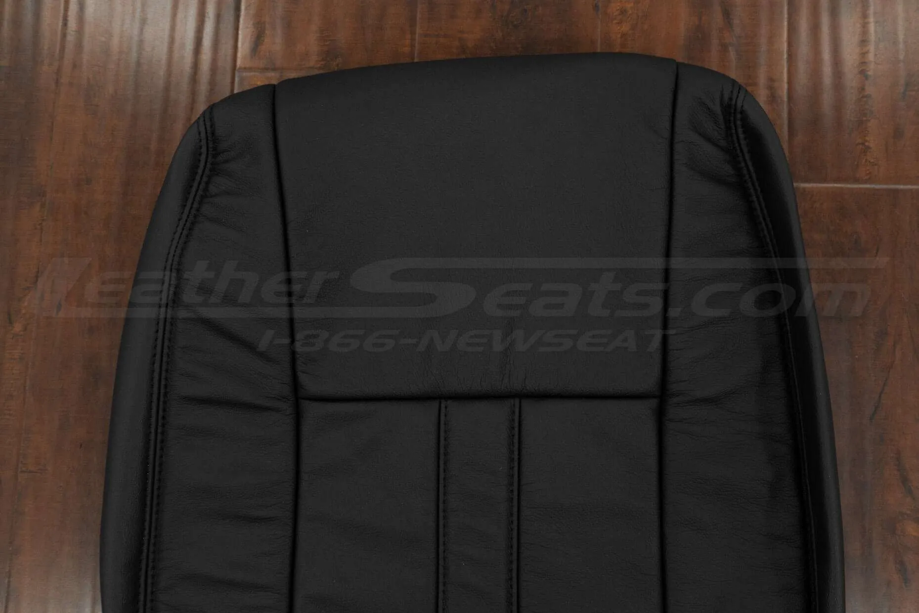Upper section of Black backrest upholstery