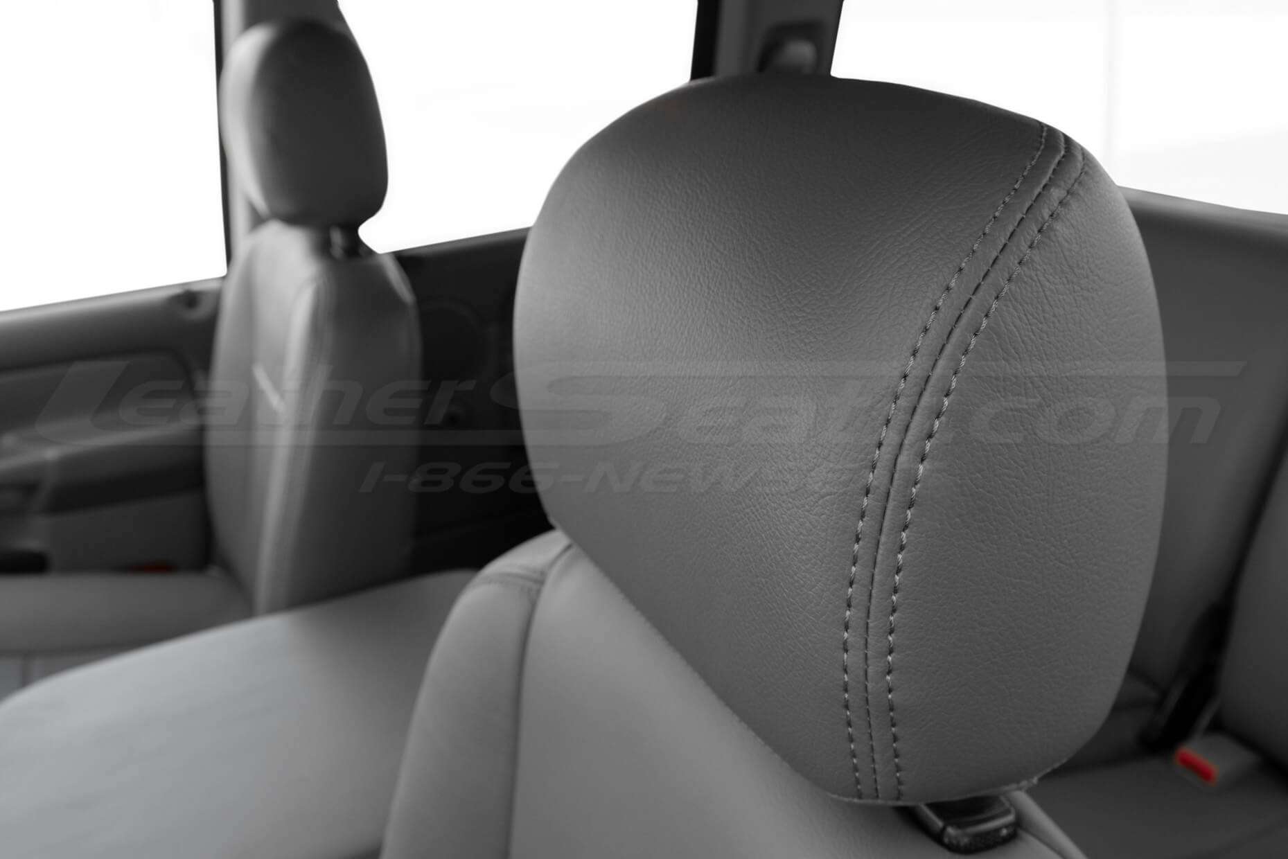 Installed Leather Headrest in Light Grey close-up