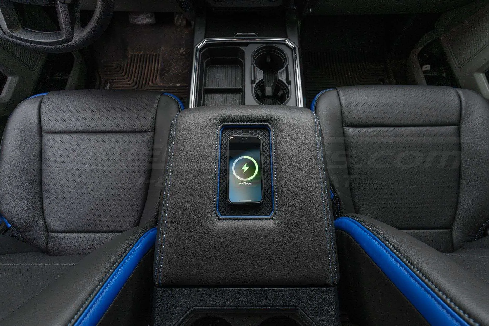 Top-down view of Wireless Phone Charging Console for Ford Trucks with phone being charged