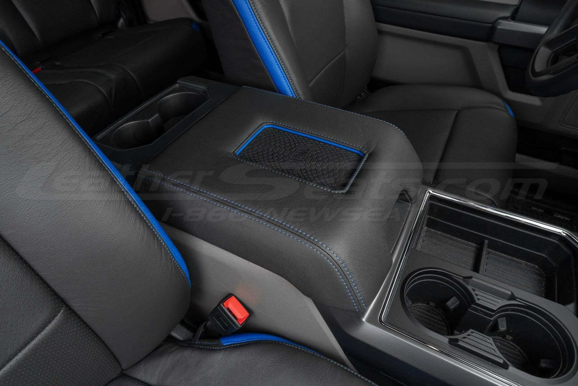 + Ford Superduty Sanctum Wireless Charging Console in Dark Graphite with Cobalt stitching and Trim Ring - Installed