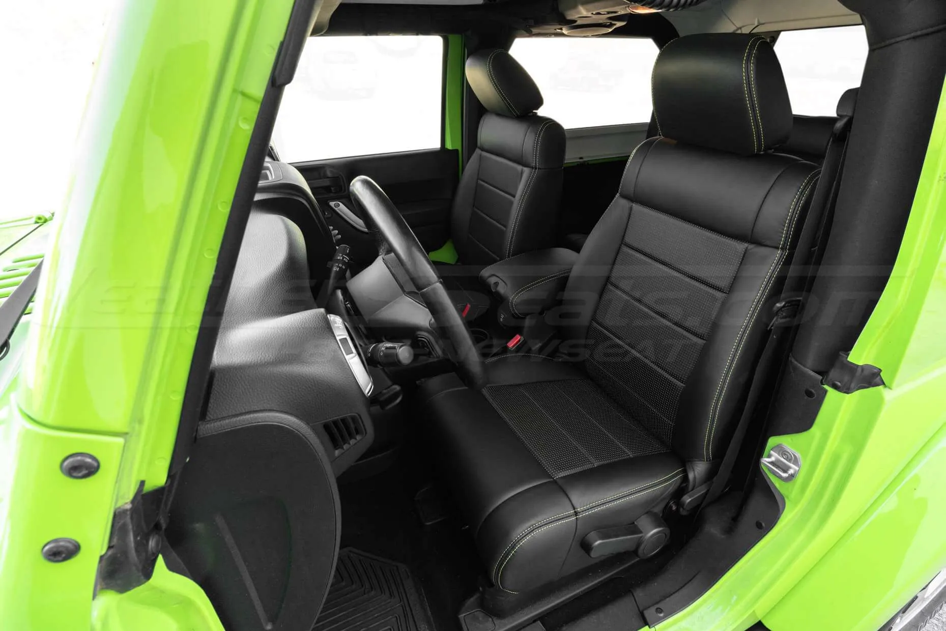 2011-2012 Jeep Wrangler JK with custom installed leather seats - Black & Piazza Green