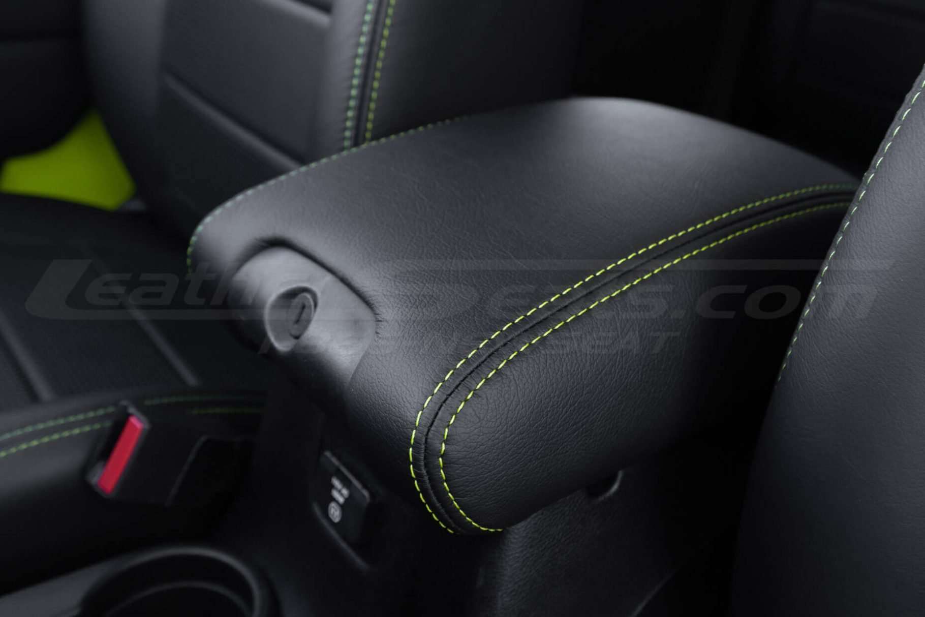 Hyper Green Contrasting Double-Stitching on console lid close-up