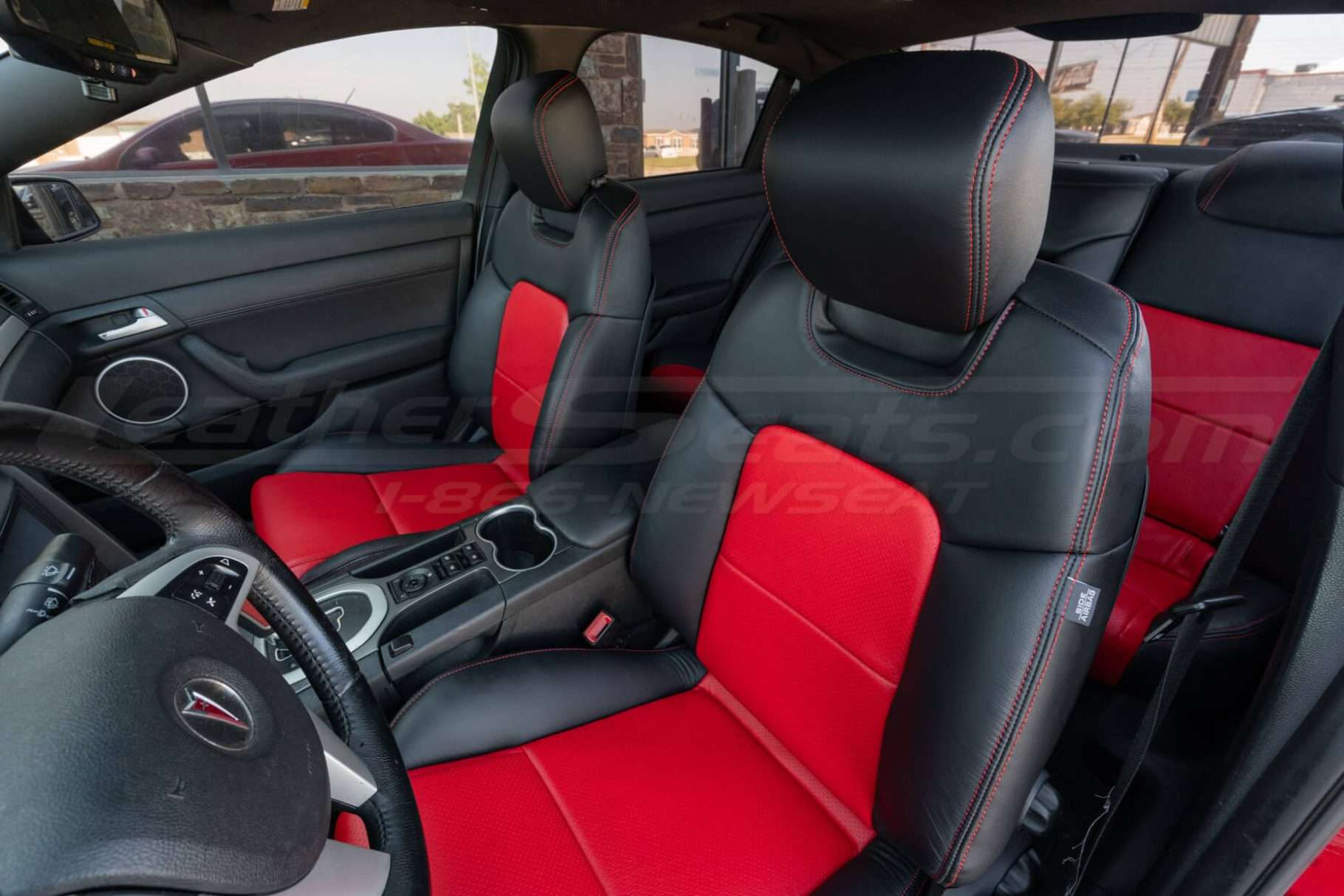 Two-tone leater backrest and headrest medium shot.