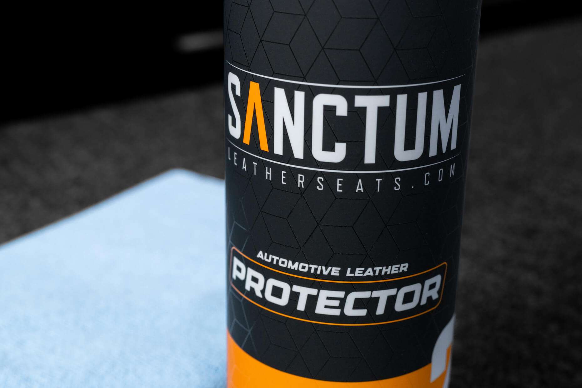 Sanctum LeatherSeats.com Automotive Leather Protector label close-up