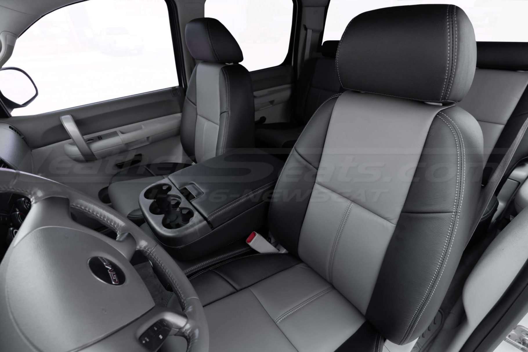 Front Driver Backrest & Headrest section of Black and Light Grey leather seats