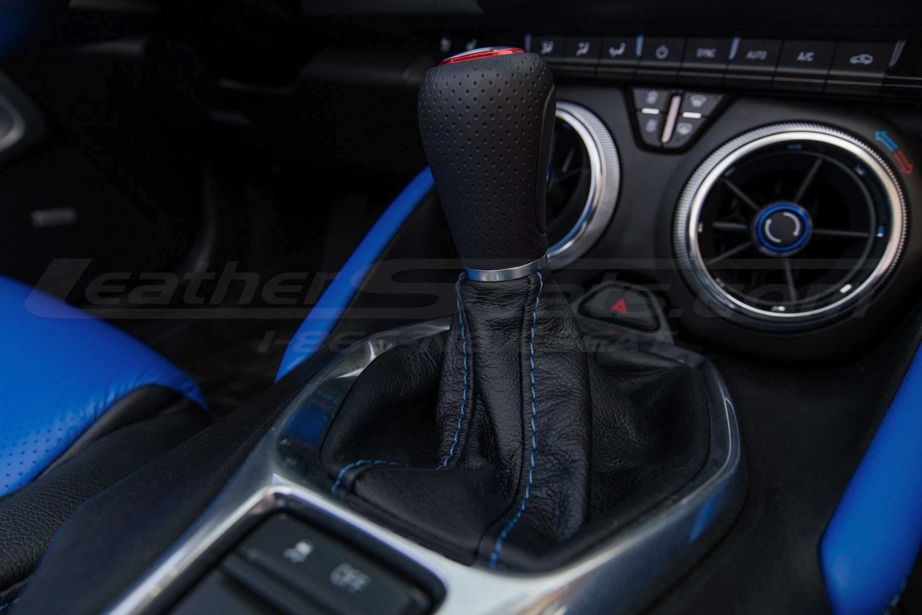 Black leather shift boot with contrasting Cobalt stitching - installed