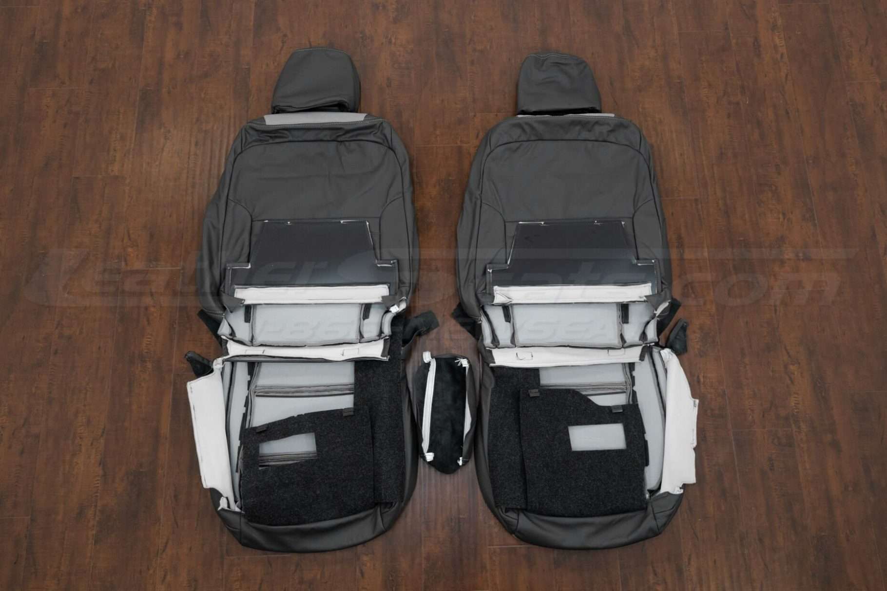 Back view of front seat upholstery & console cover