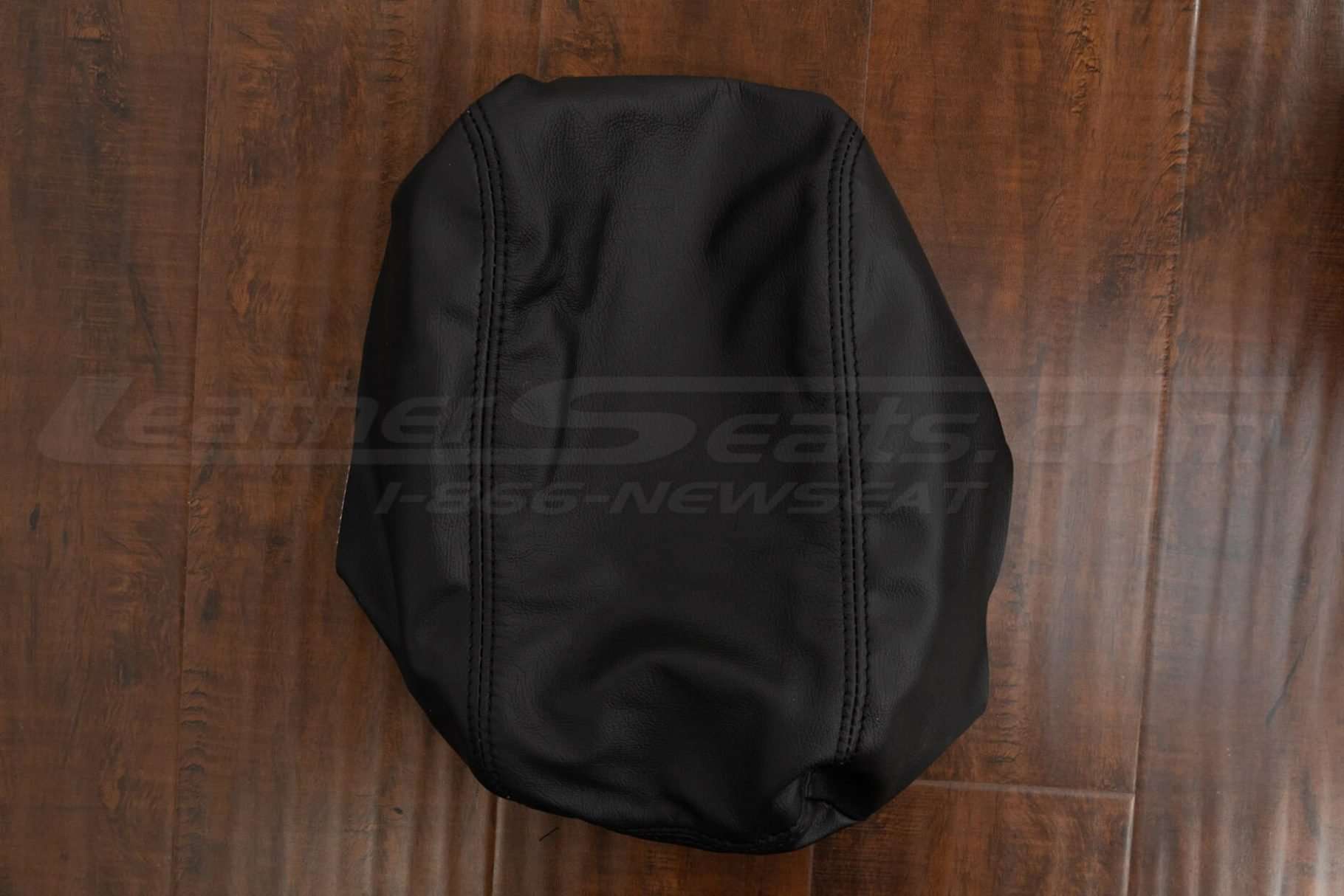 Top down view of 2020-2023 Leather console lid cover in Black