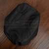 Alternate side view of black leather console lid cover
