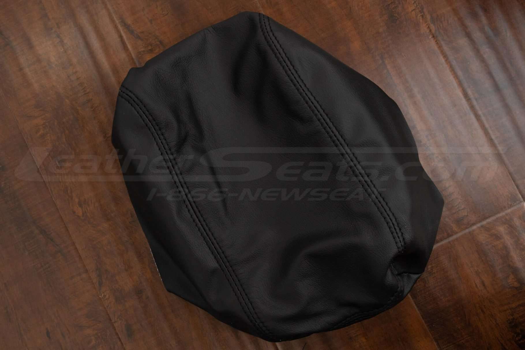 Side view of leather Chrysler 300 console lid