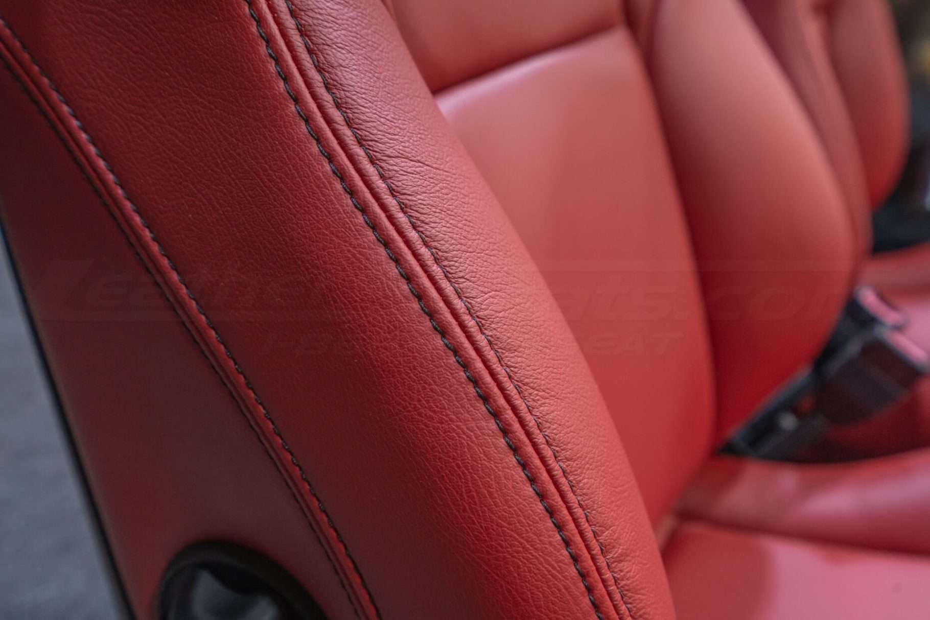 Contrasting Black double-stitching on bolsters