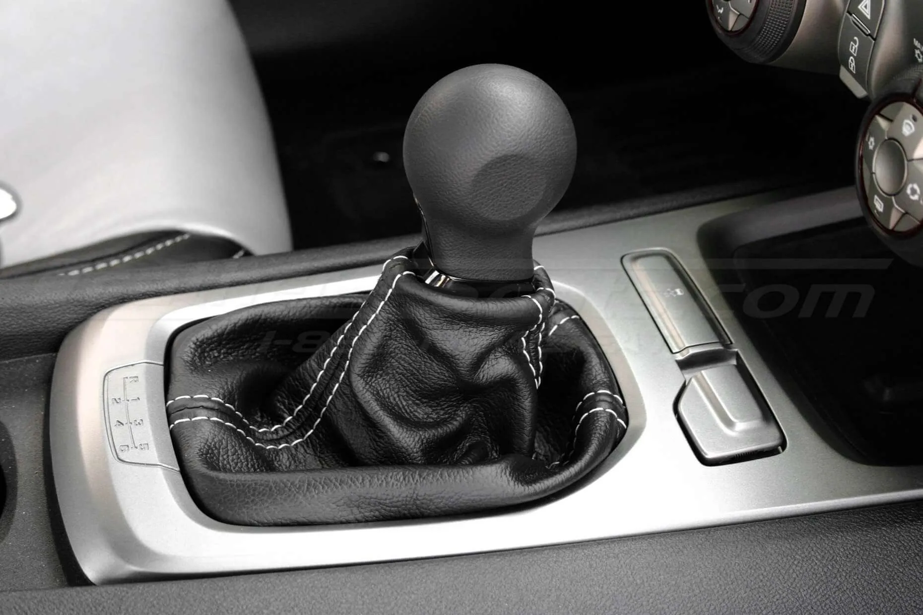 Side view of Blak leather shift boot for Chevrolet Camaro