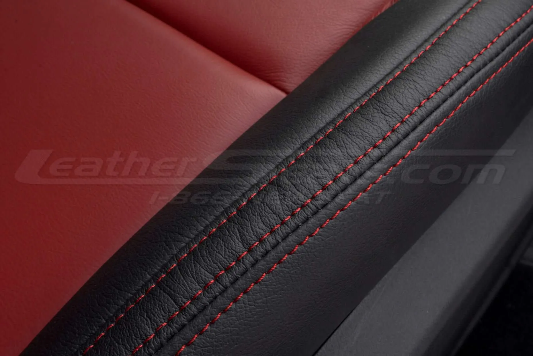Contrasting double-stitching in Cardinal on installed leather seats