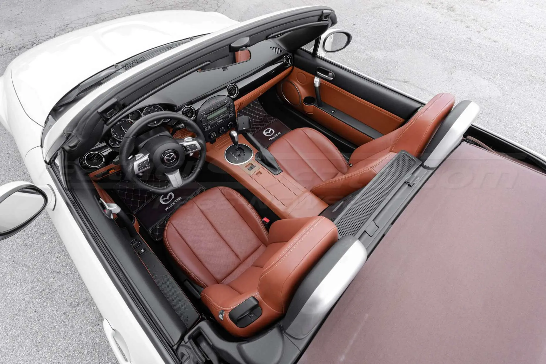 Top down- aerial view of 2006-2007 Mazda Miata Convertible with installed Mitt Brown leather seats