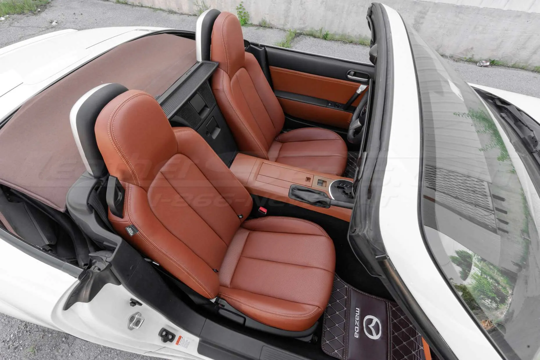 Passenger view top-down of Mazda Miata interior