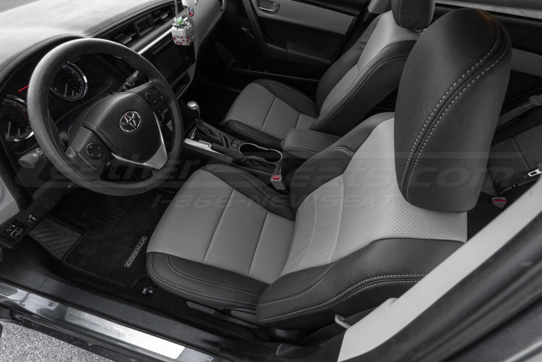 Top-down view of custom two-tone Graphite/Ash Perforated leather seats