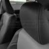 Leather headrest close-up in Dark Graphite with contrasting Ash thread