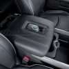 Black leather charging console charging iPhone in Dodge Ram