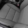 Top-down view of front driver seat in custom Light Grey leather upholstery