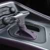 Purple leather shift boot for black double-stitching