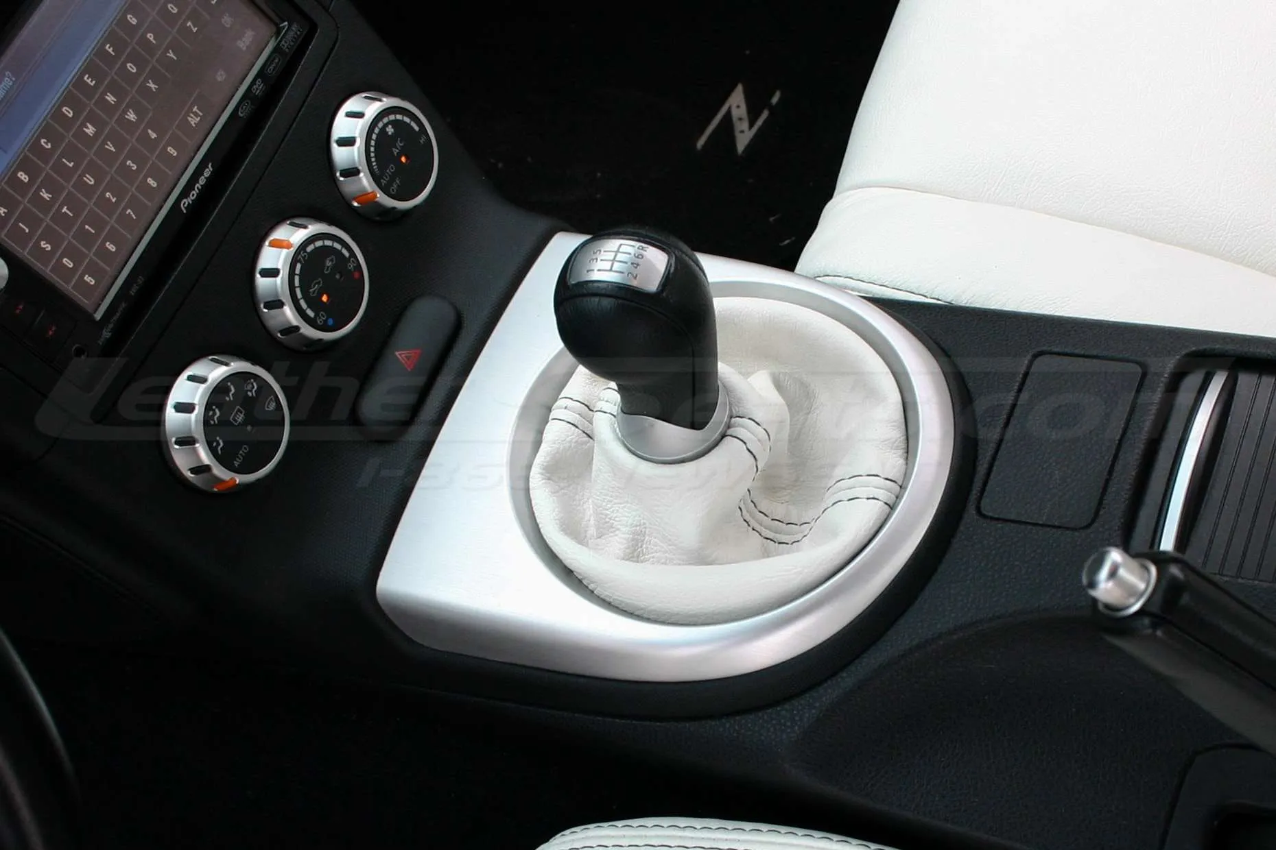 White manual shift boot with contrasting black stitching for Nissan 350Z
