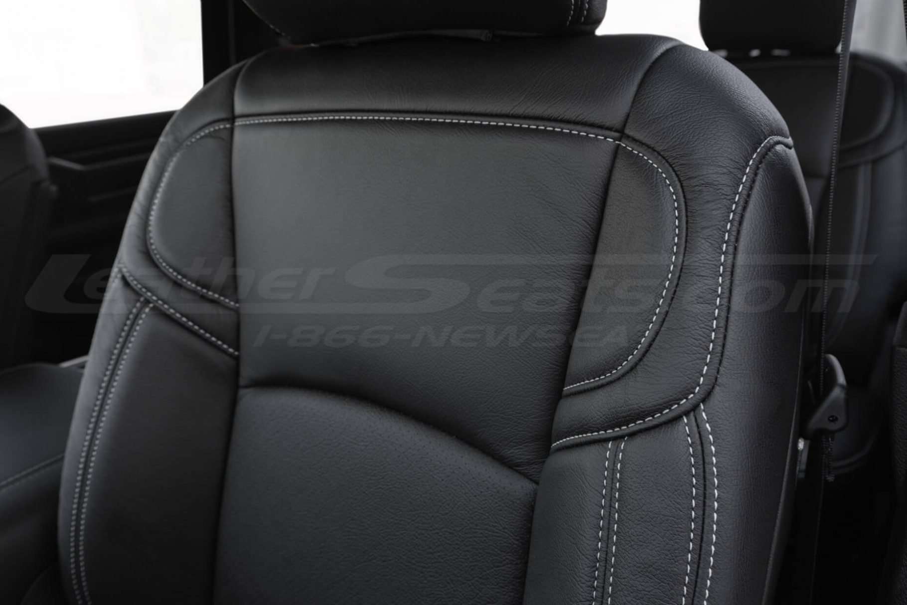 Dodge Ram leather backrest close-up with perforated and non perforated sections