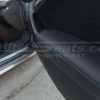 Acura TL Black Leather door armrest close-up