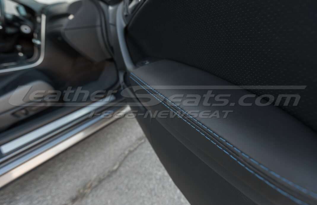 Acura TL Black Leather door armrest close-up