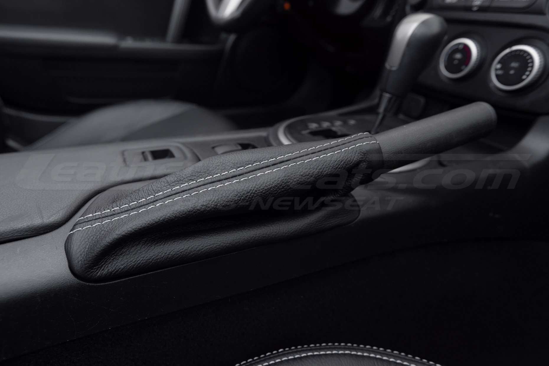 Close-up of Mazda Miata leather emergency brake upholstery
