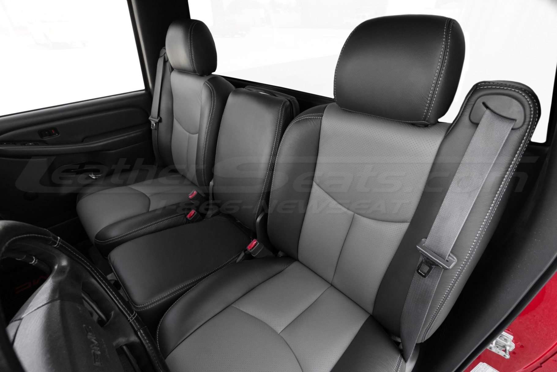 Front backrest and headrest section with center seat folded up