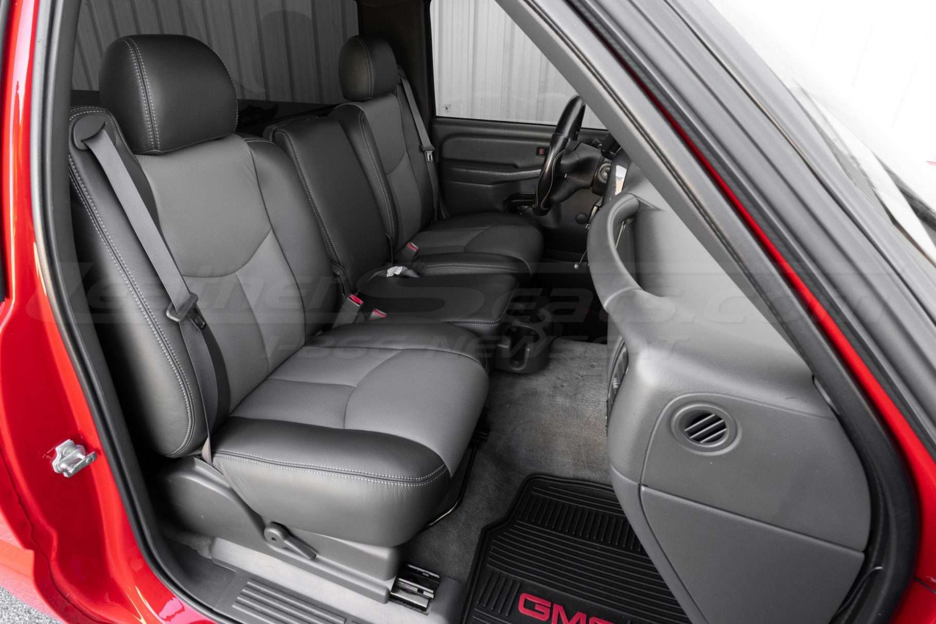 Installed front passenger leather seats with jump seat