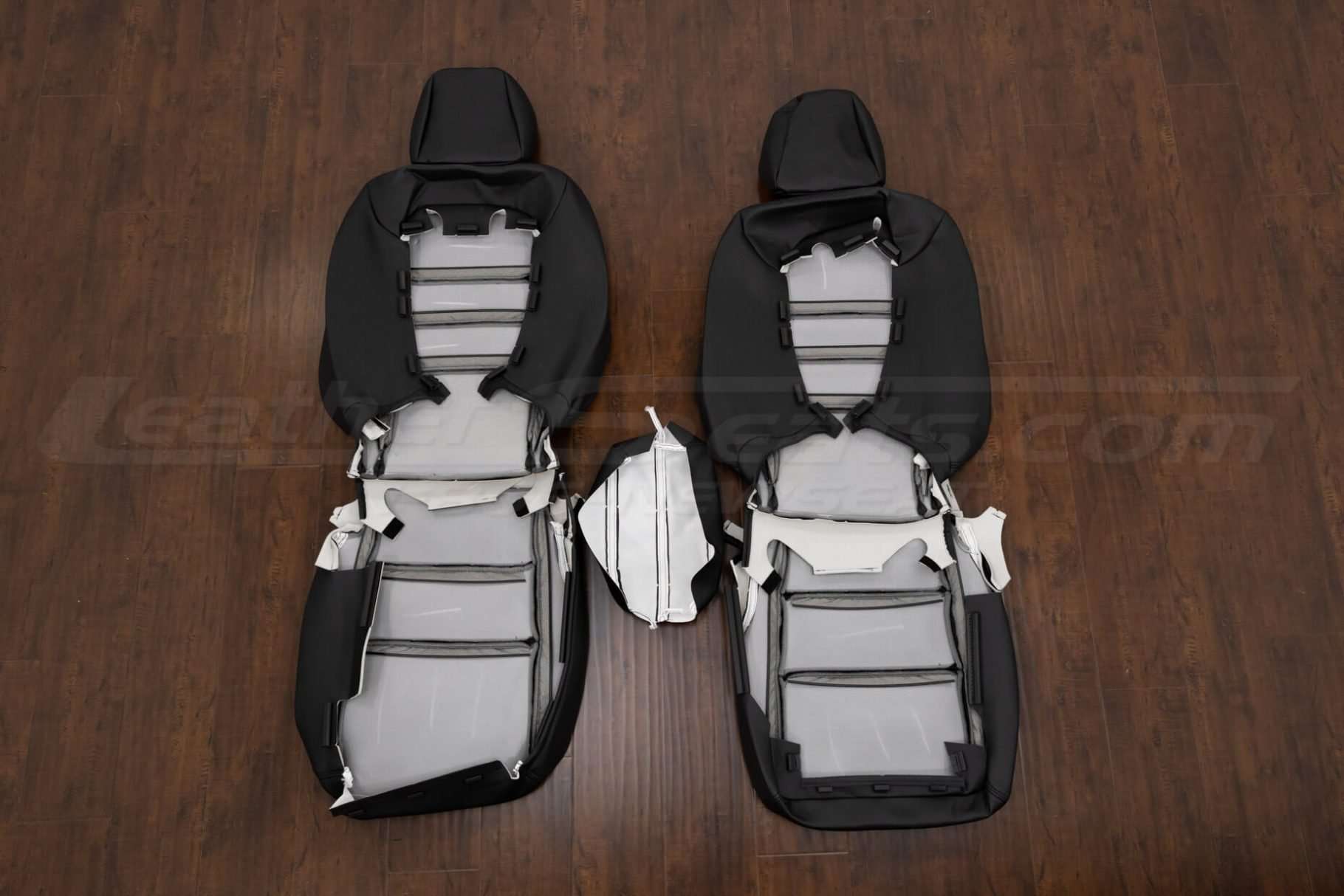 Back view of front seat upholstery and console