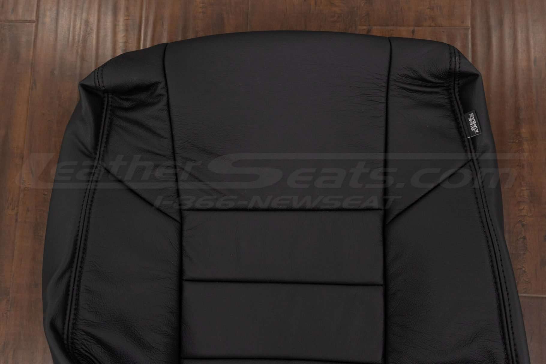 Upper section of backrest upholstery