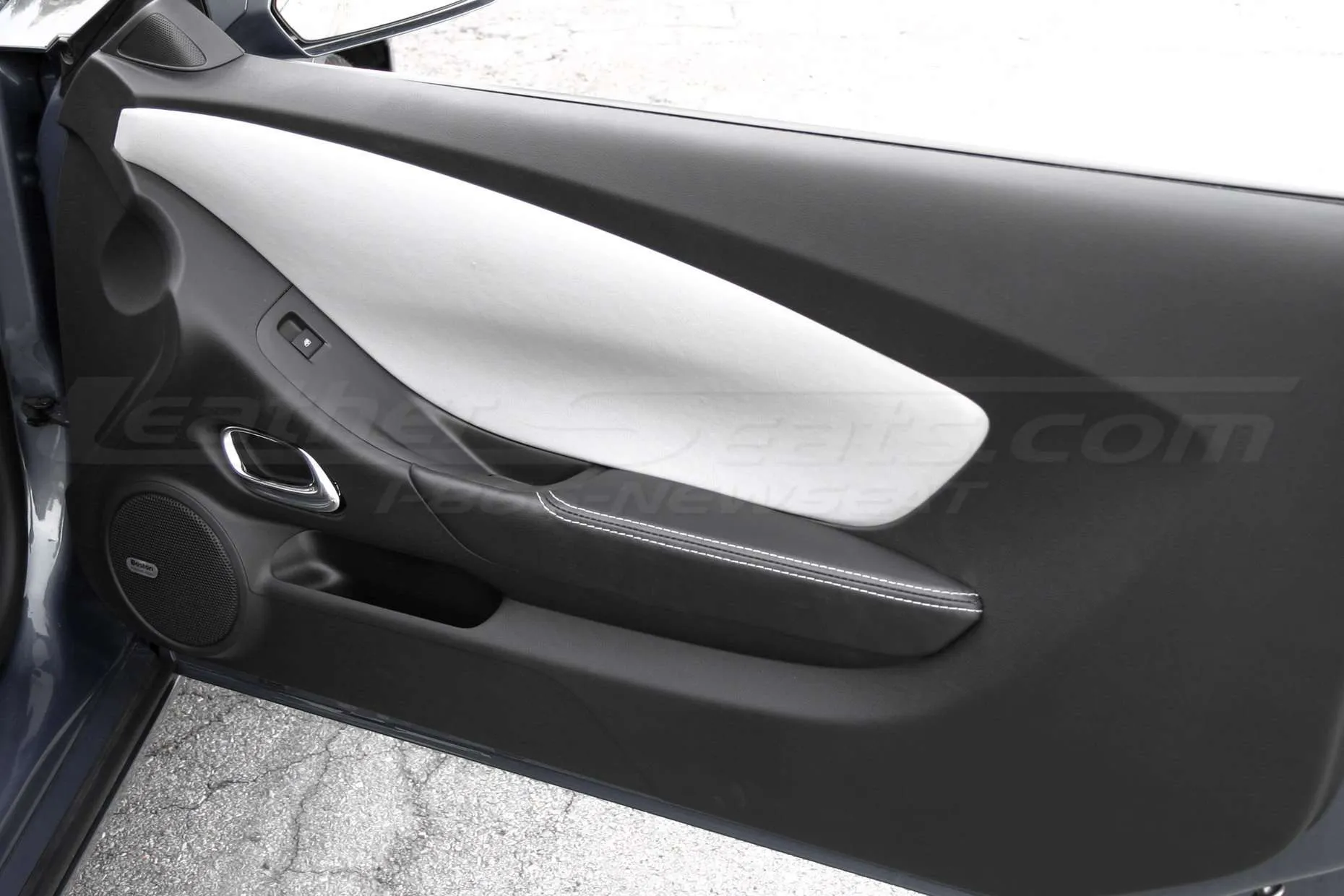 Custom leather door panel insert and door armrests for Chevrolet Camaro
