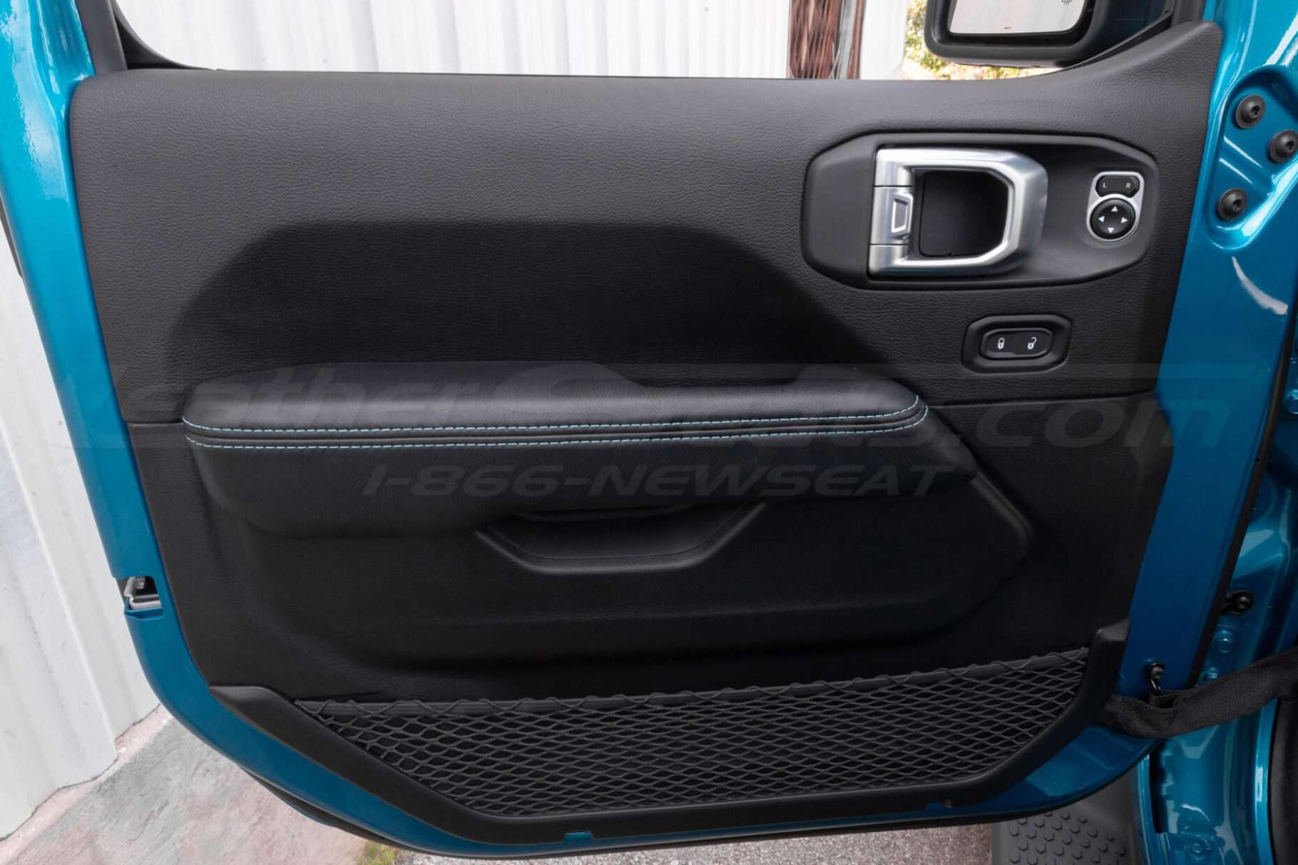 Full door view of custom door armrest upholstery