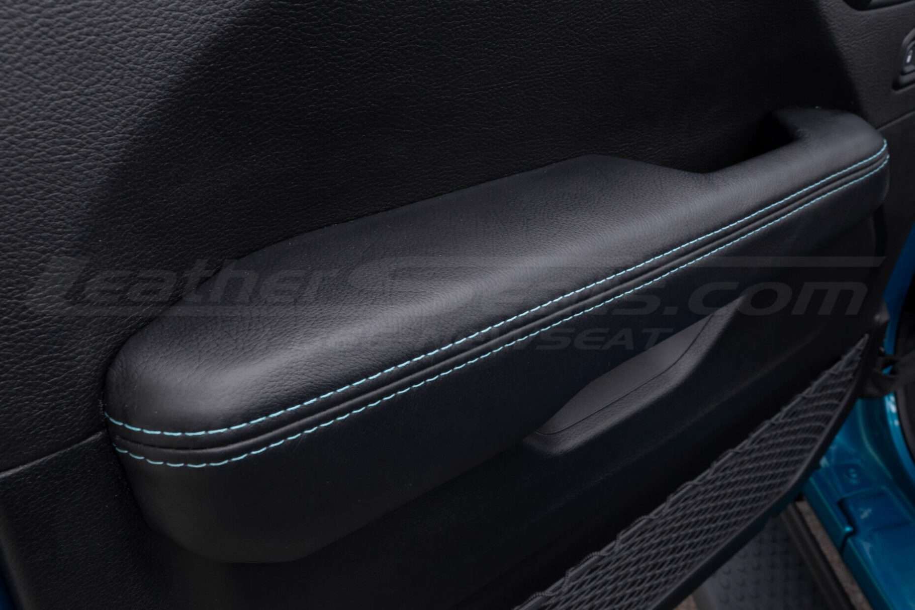 Jeep Wrangler door armrest upholstery with contrasting stitching
