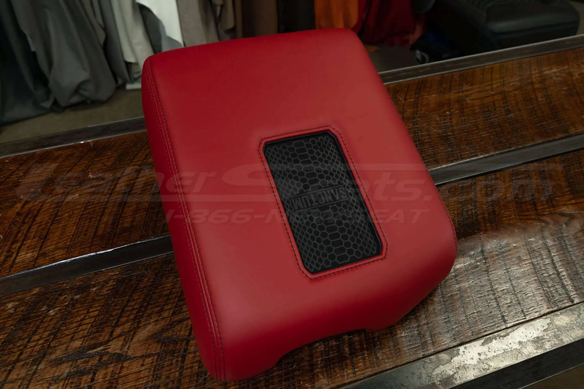 QI Phone Charging Console in Red leather with Black stitching and Black trim ing