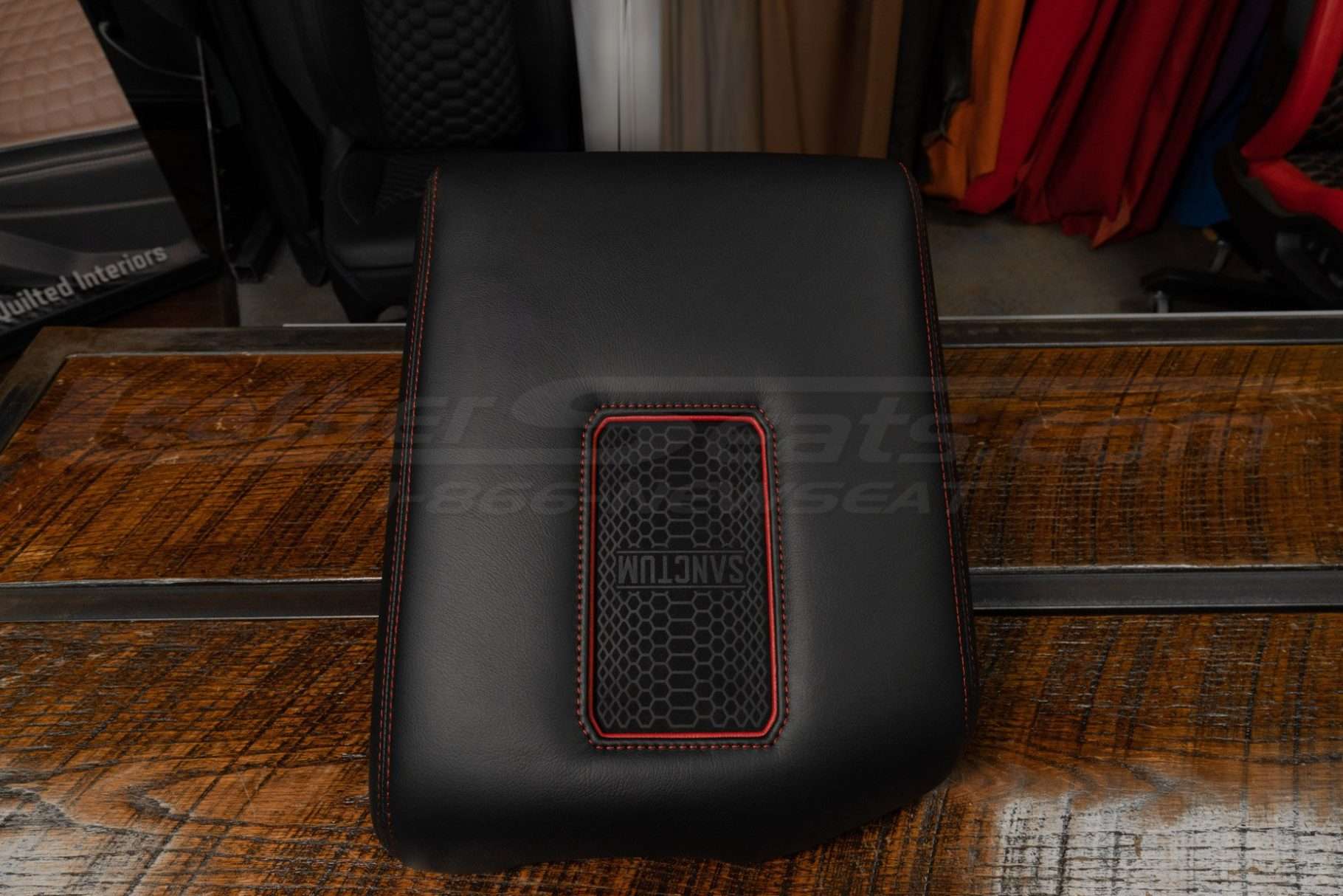 Toyota Tundra Wireless Phone Charging Console with Black leather, Bright Red stitching and Bright Red trim ring