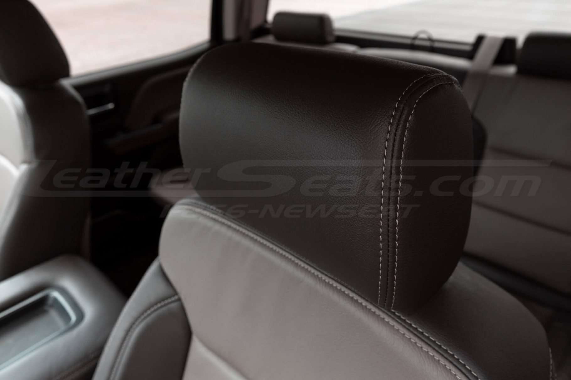 Leather Coffee headrest close-up with contrasting stitching in Bristol
