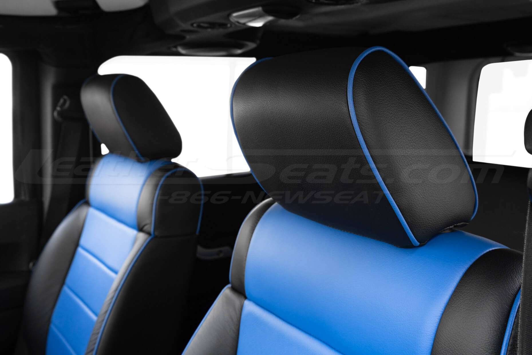 Black leather headrest with Cobalt Blue Piping - close-up