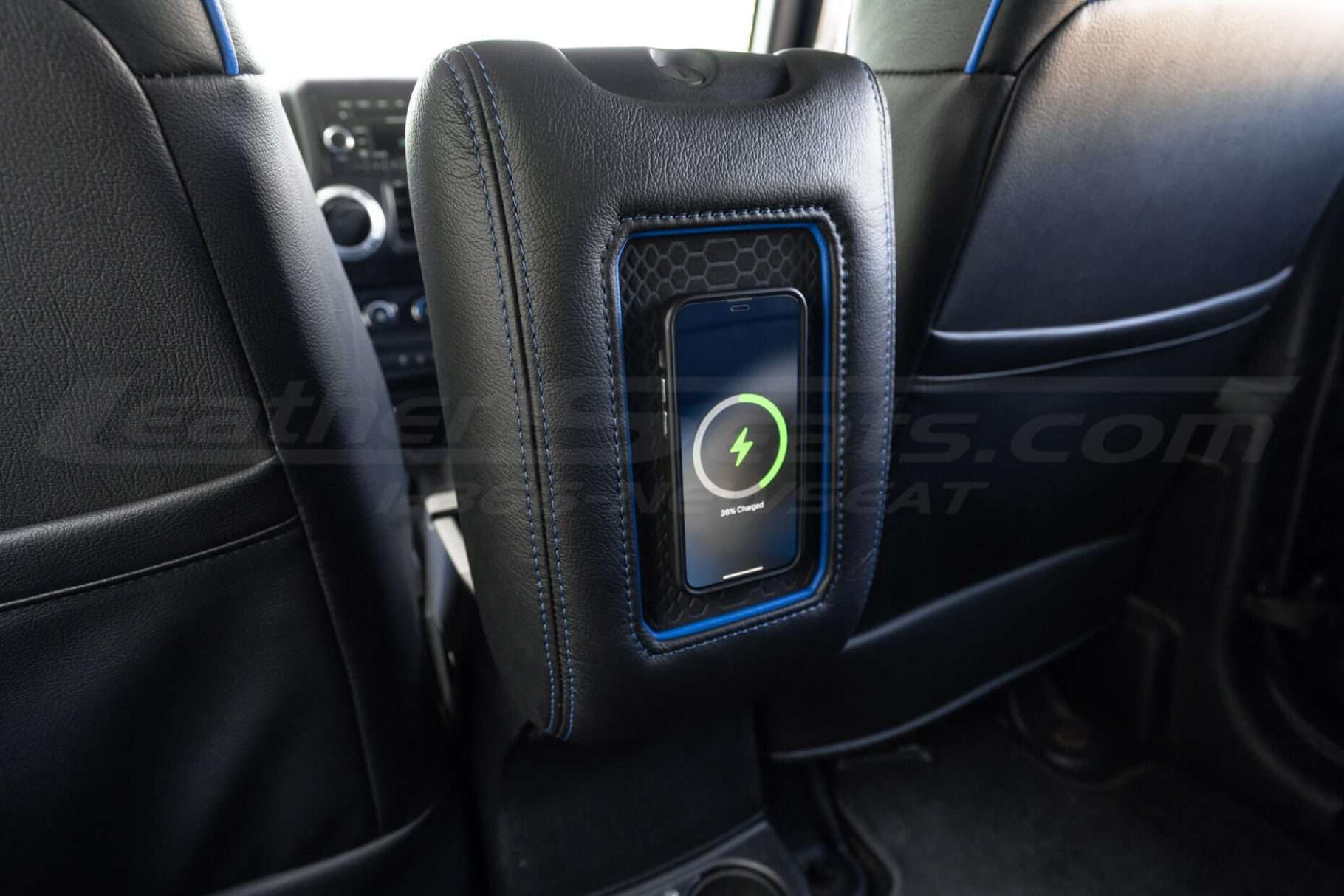 Magnetic phone charging pad on Jeep Wrangler JK center console