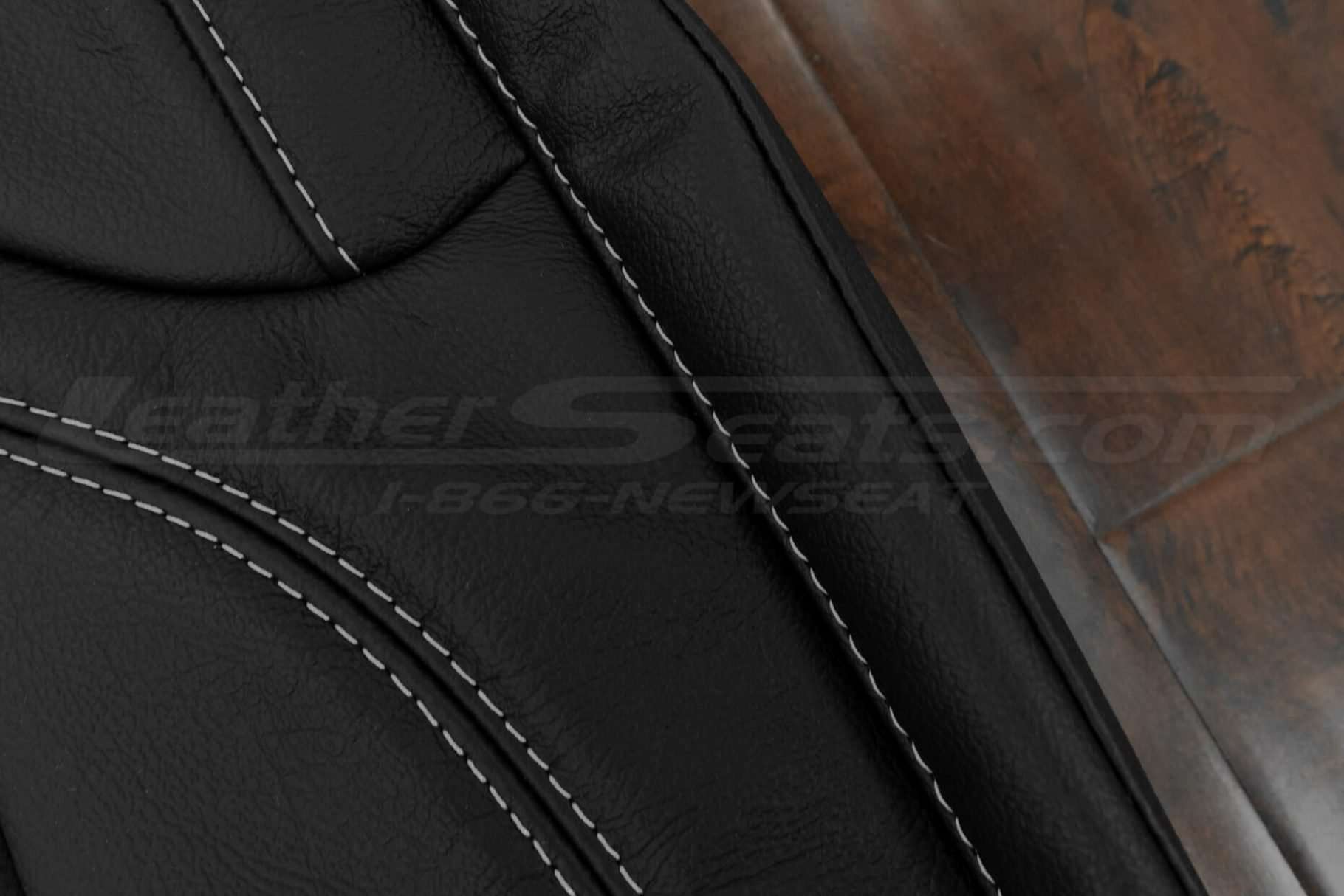 Contrasting Silver stitching on Black leather