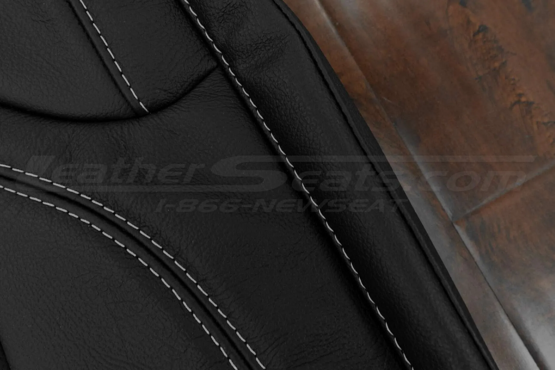 Contrasting Silver stitching on Black leather