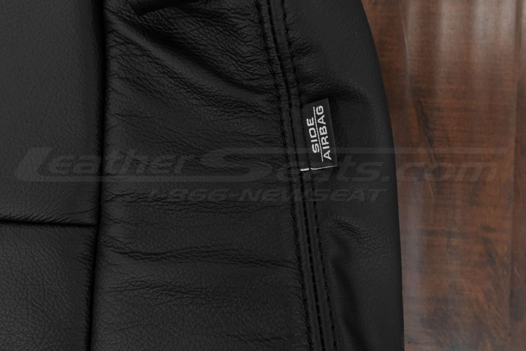 Side Airbag Tag on leather seat upholstery