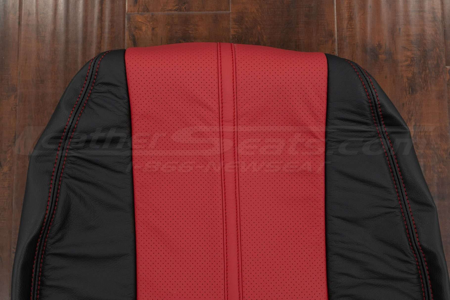 Upper section of front backrest upholstery